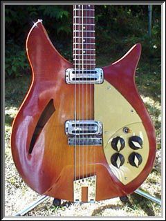 1959 330 Fireglo Capri with toaster-tops and oven-knobs.