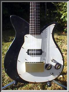 1957 Combo 900. Early version of student-size solid body, prior to the alteration of the right cutaway.